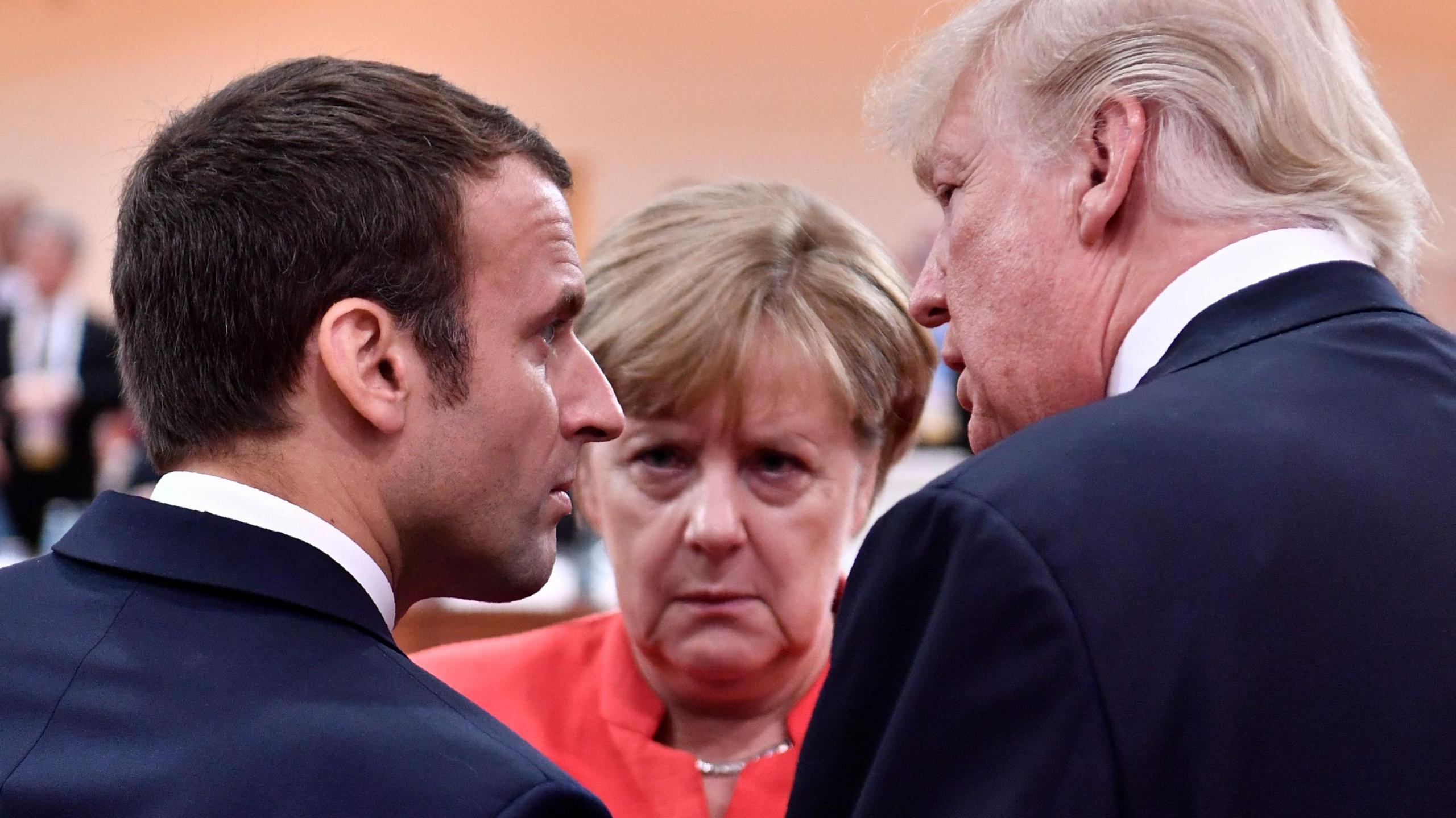 Angela Merkel with Donald Trump and Emmanuel Macron