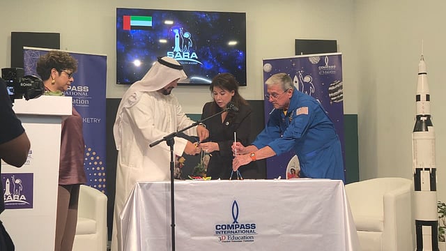 Engr Naser Al Rashdy, Ms Lina Lampkin, and Dr Don Thomas doing a space challenge.