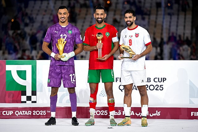 Morocco's goalkeeper #12 Mehdi Benabid, Morocco's midfielder #6 Mohamed Rabie Hrimat and Jordan's forward #9 Ali Olwan pose with the Golden Glove, Player of the Tournament and Golden Boot awards after the FIFA Arab Cup 2025 final football match between Jordan and Morocco at the Lusail Stadium Stadium, in Lusail on December 18, 2025.