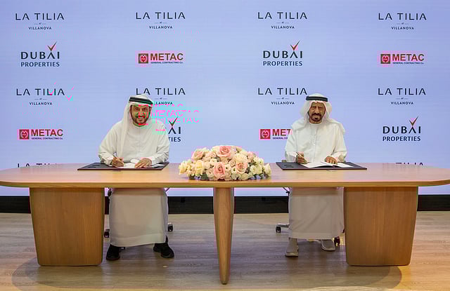 Dubai Holding Real Estate CEO, Khalid Al Malik, alongside Metac General Contracting Co General Manager, Muhammad Sadiq Abdullah, officially signs the construction contract to expand Villanova with 850 new homes.